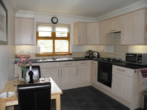One bedroom lodge kitchen/dining area at Bracken Lodges Self-Catering Holiday Loch Tay Kenmore Killin Perthshire