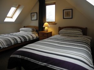 Twin bedroom in three bedroom lodge